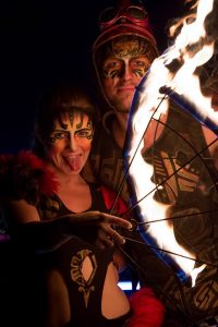 Loretta-hope-festival-fire-performer-LED-glow-poi-fire-fans-fire-eater-dance-entertainment-area-51-agency-Bestival-2014-stilt-walker-event-photography